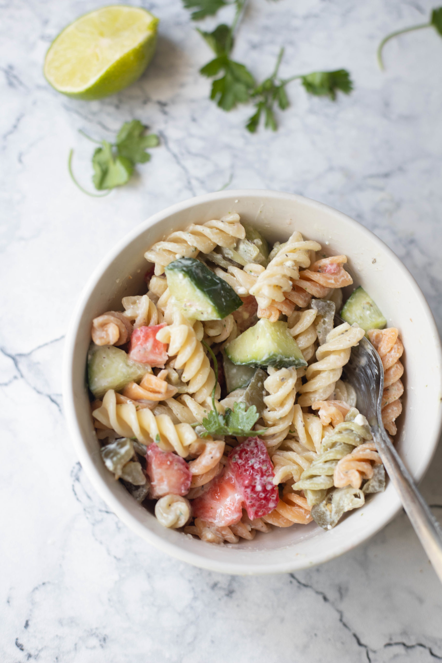 a bowl of low fat pasta salad