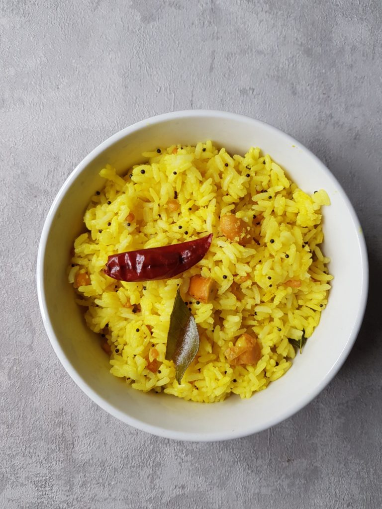 indian lemon rice in a white bowl