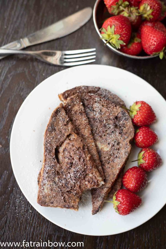 Chocolate french toast served with strawberries