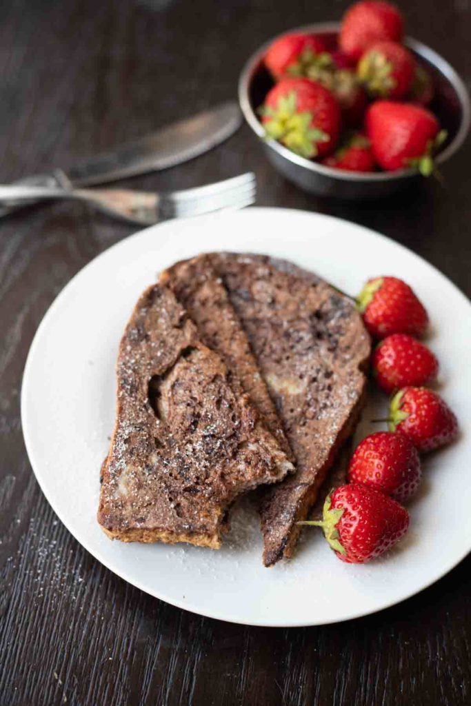 Chocolate french toast served with strawberries