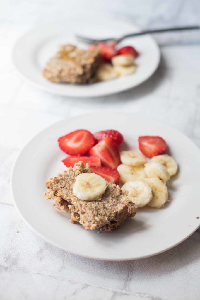 Peanut butter banana baked oatmeal served with fruit