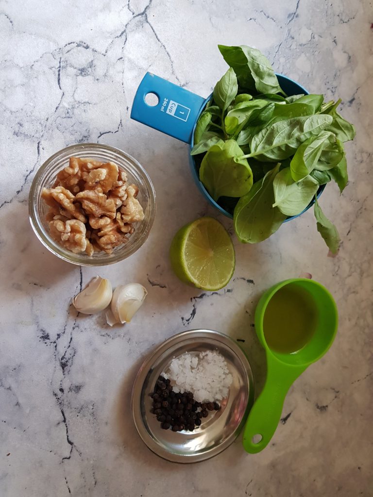 Basil leaves, walnuts, garlic cloves, salt, peppercorns,lemon,olive oil