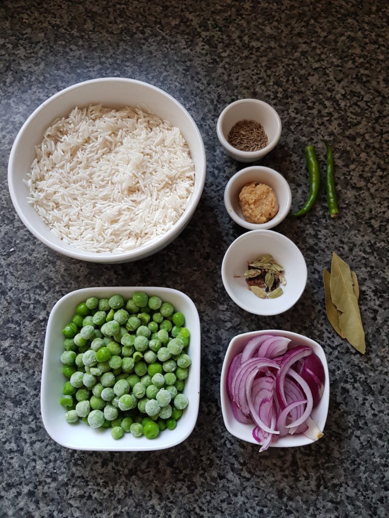 Green peas, basmati rice, onions, whole spices, ginger garlic paste,bay leaves, green chilli, cumin seeds