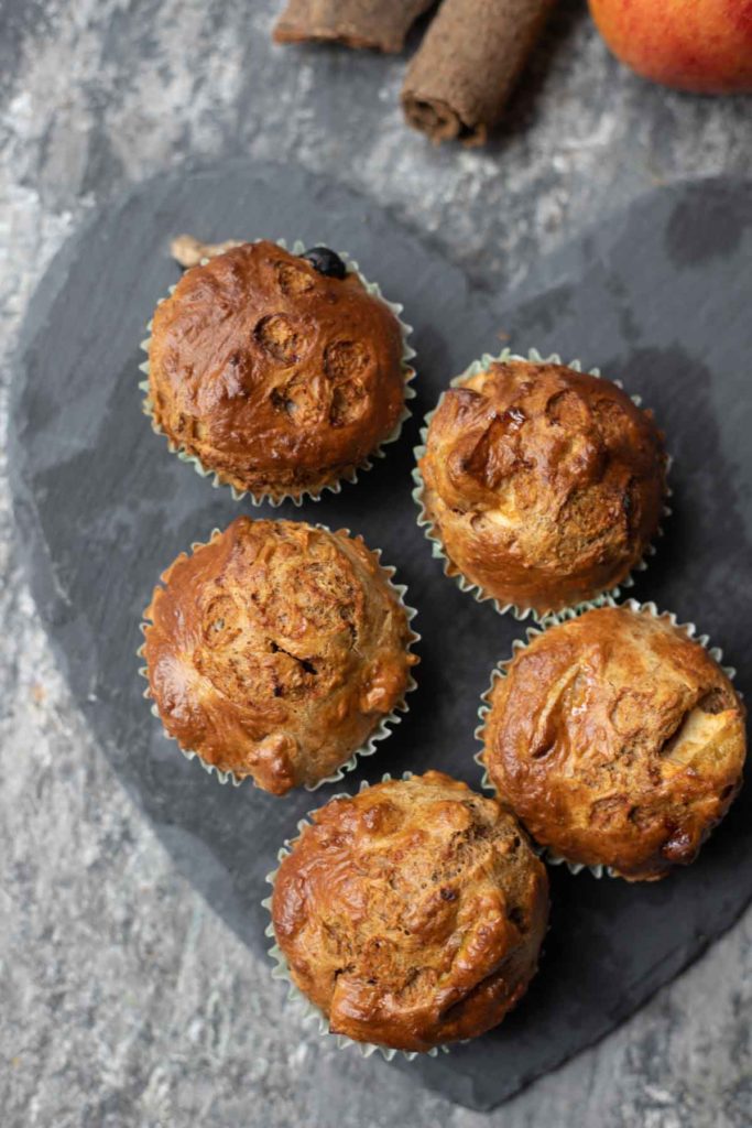 5 weetabix apple muffins served on a stone tray