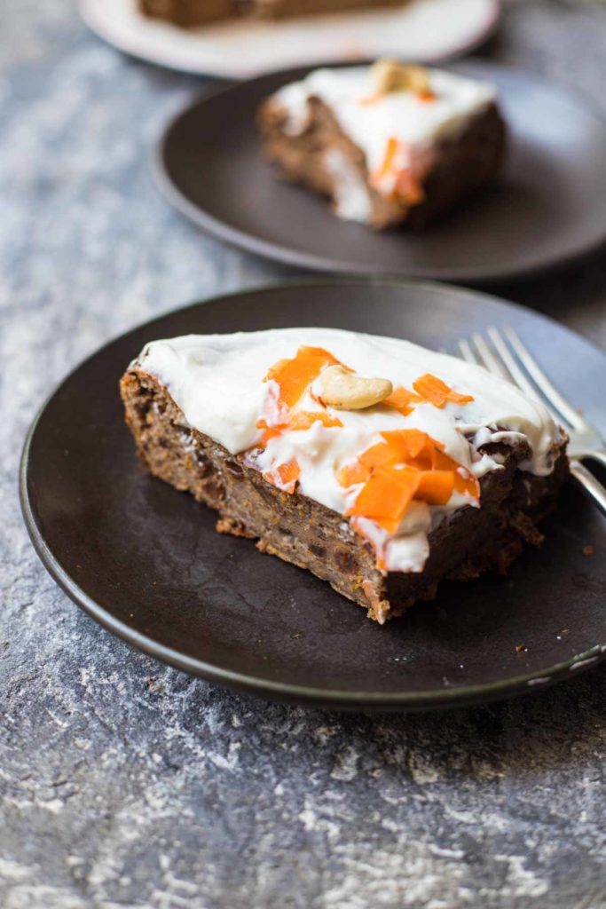 a slice of weetabix carrot cake served on a plate and fork