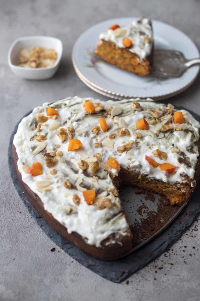 butternut squash cake topped with nuts