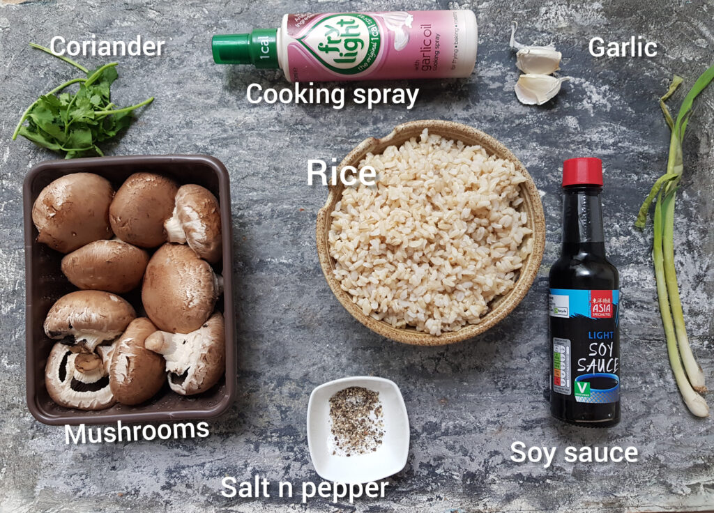 ingredients for mushroom fried rice, mushrooms, cooked brown rice, soy sauce, green onions, salt, pepper,cooking spray, coriander, garlic