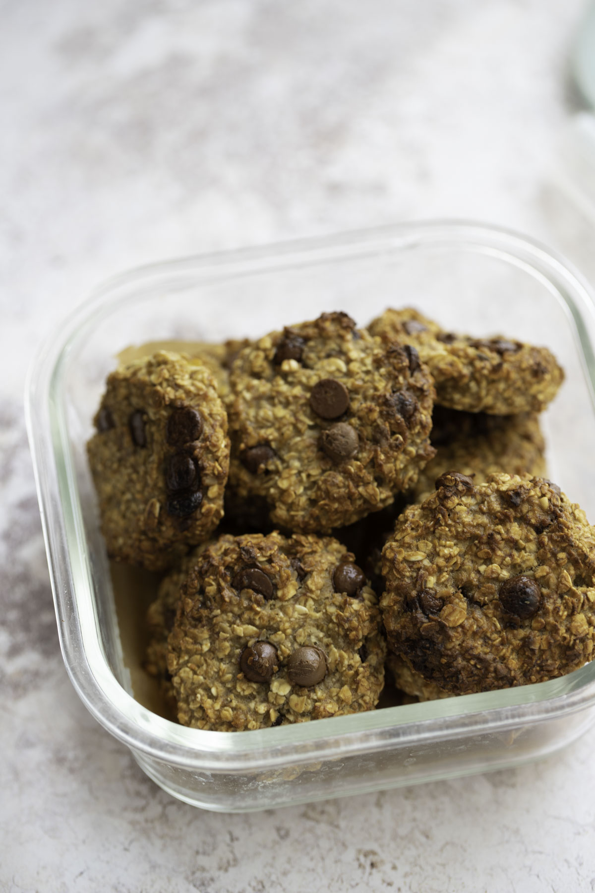 banana cookies stored in a glass  container