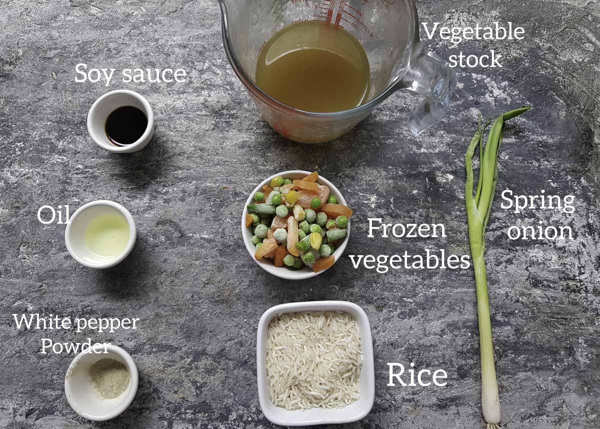 ingredients for baked fried rice , rice, vegetables, white pepper, oil, soy sauce, vegetable stock