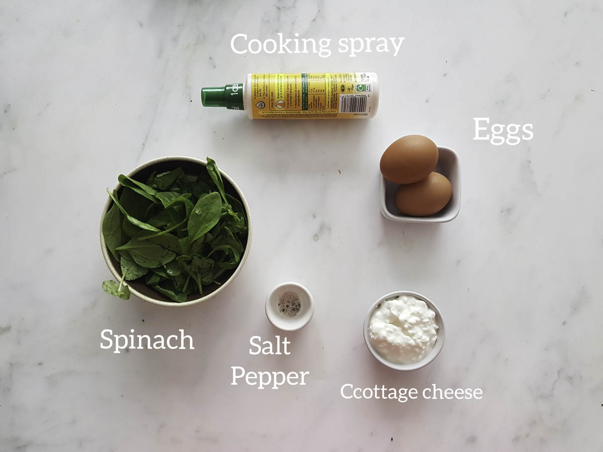 ingredients showcase spinach, cottage cheese, salt, pepper,egg, cooking spray